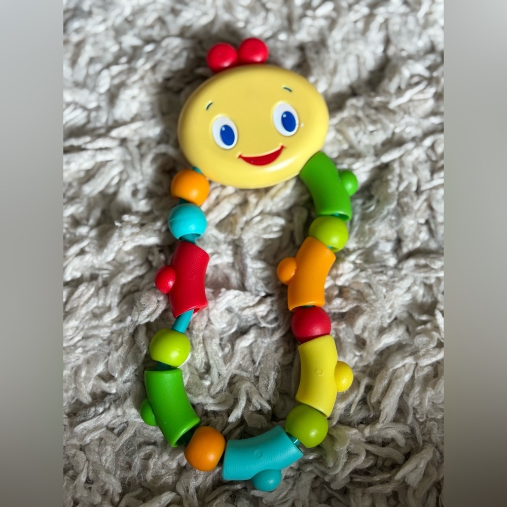 Bright Starts Twist & Teethe New Teether Colorful Caterpillar Baby Rattle Toy